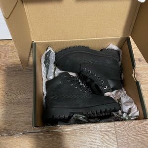 Toddler black timbs.